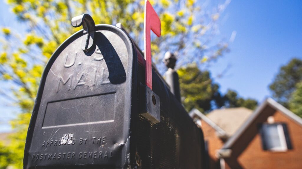 selective focus photography of a mailbox